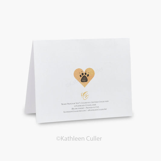 White card with gold heart and paw print design on a white background