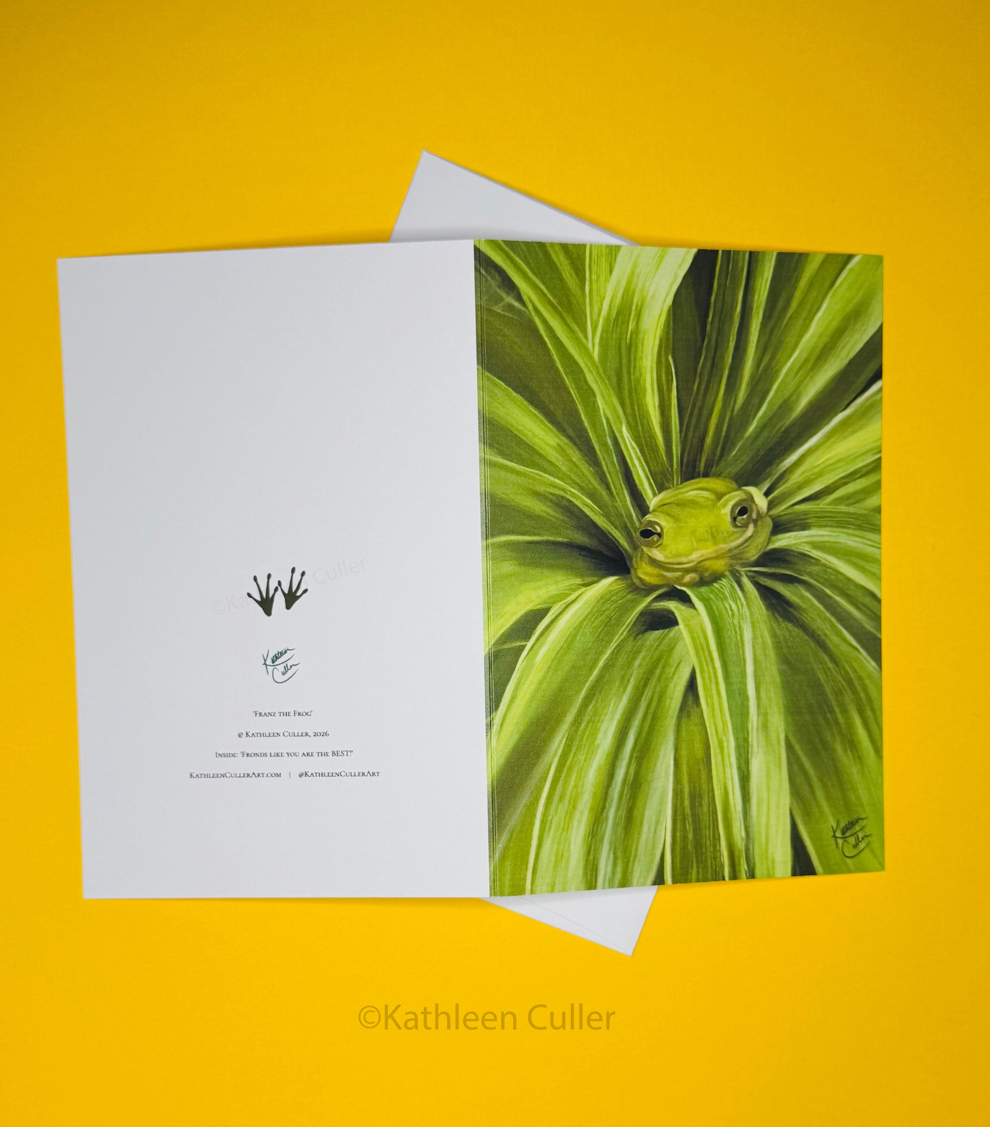 Greeting card with a frog design on a yellow background