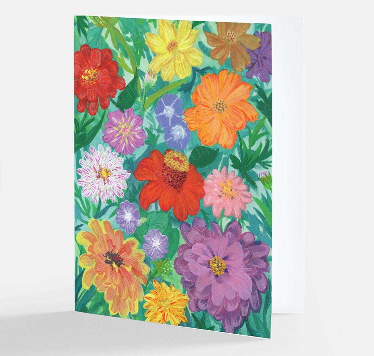 Floral patterned paper with colorful flowers on a green background